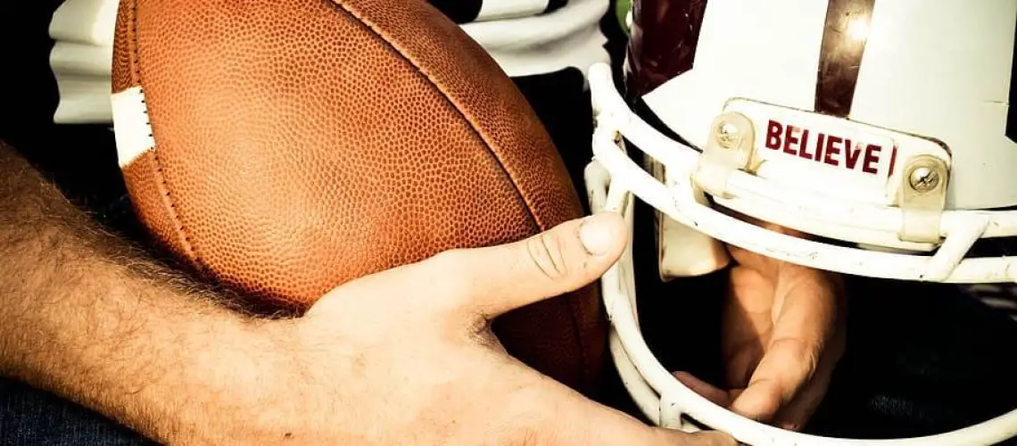 why do football players tape their fingers